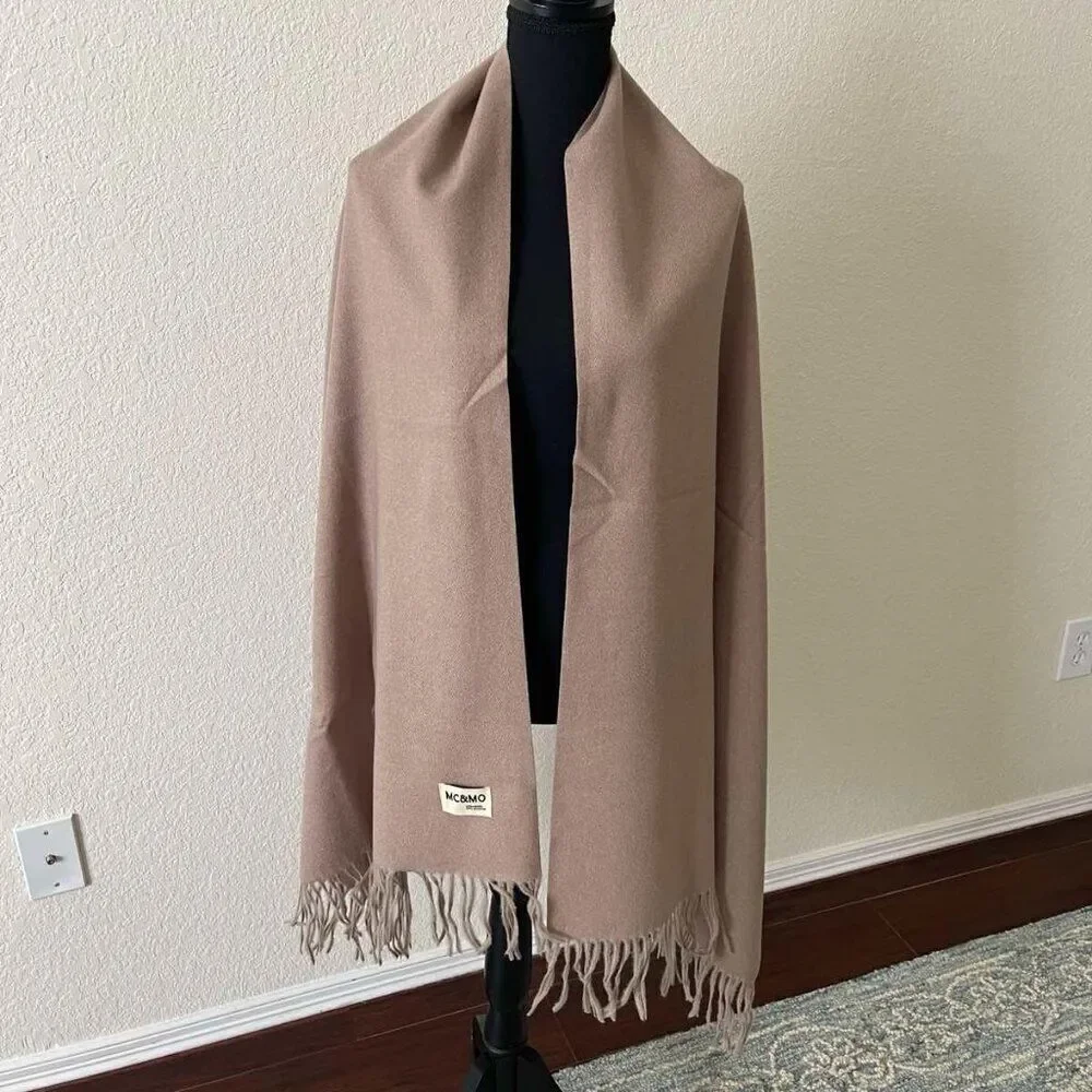 Brown Soft warm scarf is a mixture of polyester and viscose condition is new